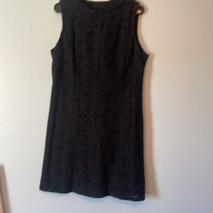 Gently used size 14 dress midi Marina black beautiful pattern with lining